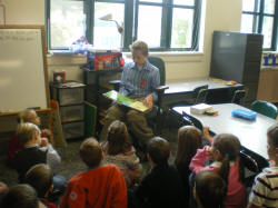 Daniel Hackerman reading to students